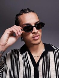 Oval sunglasses in black with smoke lens